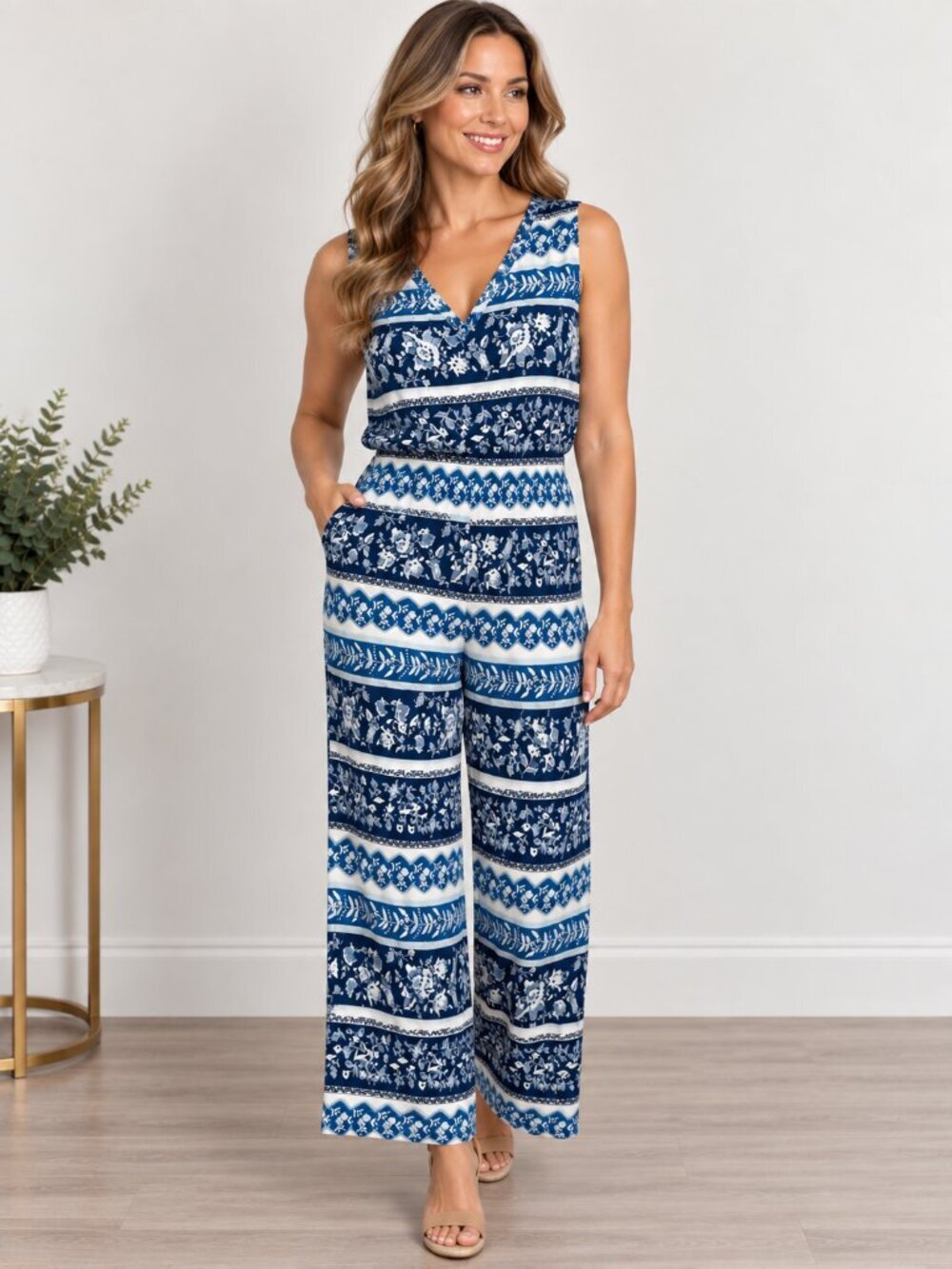 LOFT‎ Blue Floral Jumpsuit with Elastic waist and side pockets.  Size Large